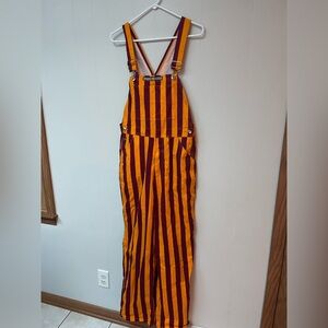 Game bibs 
Size small maroon orange/gold